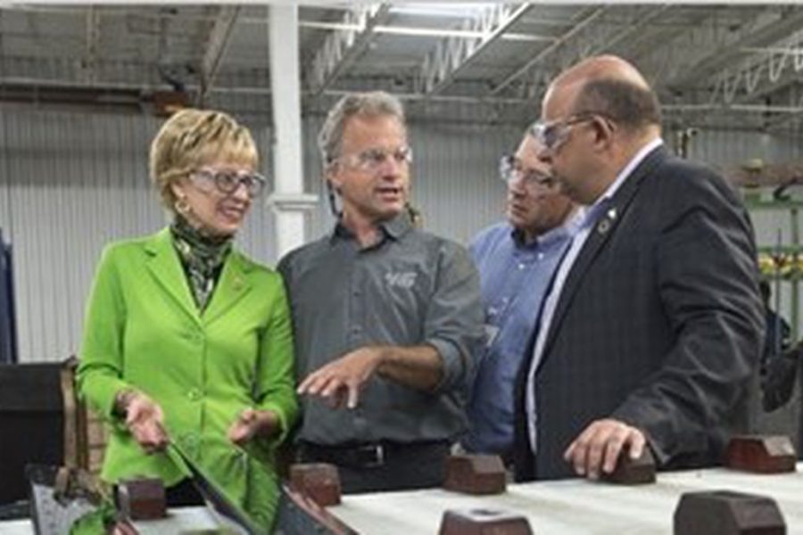 Group photo of Kitchener Centre MPP Daiene Vernile, left, Kuntz Electroplating excutive vice-president Dave Kuntz, Waterloo Region Chair Ken Seiling and Kitchener Mayor Berry Vrbanovic